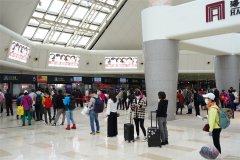 商品編碼查詢-氣溫攀升 客流回暖 海口美蘭國際機場戰“疫”復工兩手抓（附圖